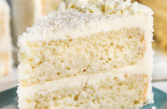 plated Coconut Cake with cake in the back