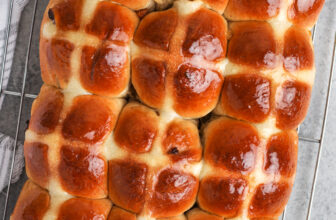 Hot Cross Buns cooling on a baking rack