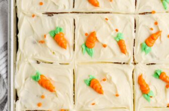 ambrosia salad in a bowl topped with a cherry