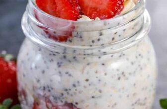 a jar of overnight oats with bananas and strawberries