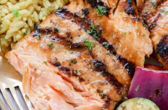 plated Easy Grilled Salmon with rice and vegetables
