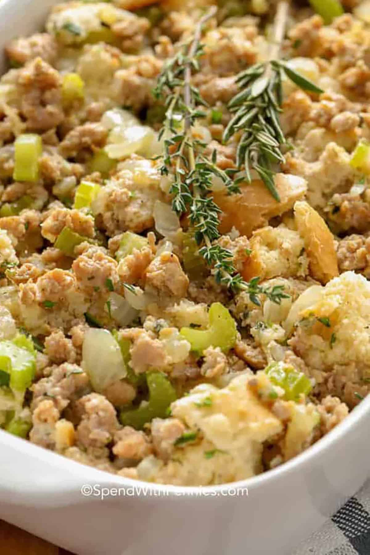 mashed potatoes in an Instant Pot with pats of butter and parsley as garnish