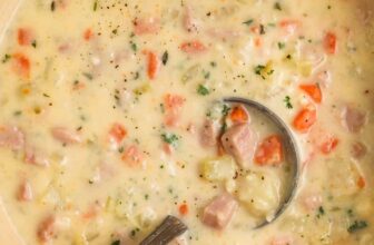 spinach artichoke dip in a white dish