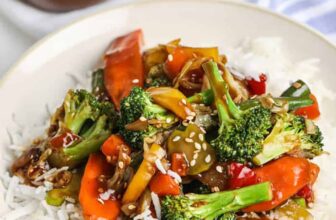 Stir fry sauce served over veggie and rice