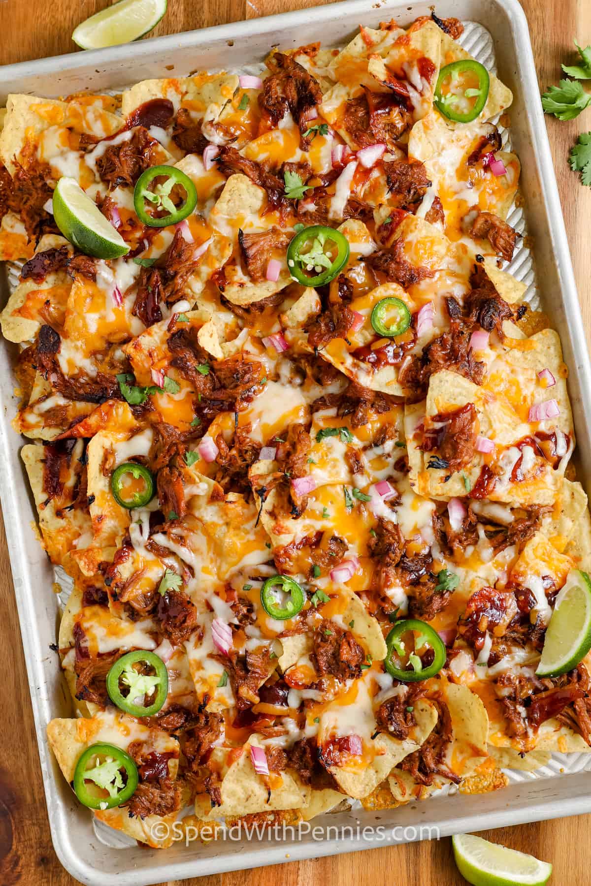cheesy Pulled Pork Nachos on a sheet pan