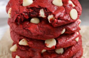 pile of Red Velvet Cake Mix Cookies with a bite taken out