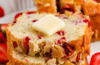 Strawberry Bread cut into slices with butter